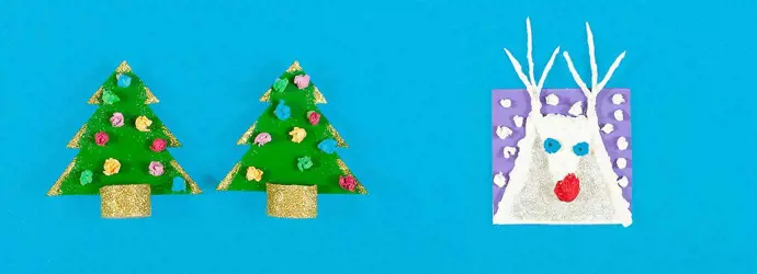 Tarjetas de Navidad DIY hechas de cartón, papel de seda y purpurina con forma de árboles de Navidad y un reno blanco