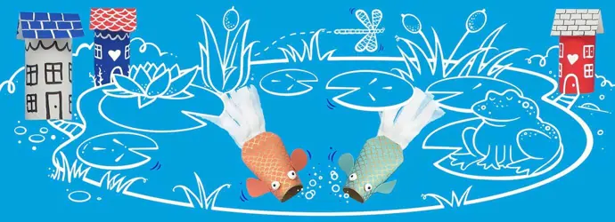 Pez y casas hechas con tubos de cartón colocadas alrededor de un estanque de peces dibujado
